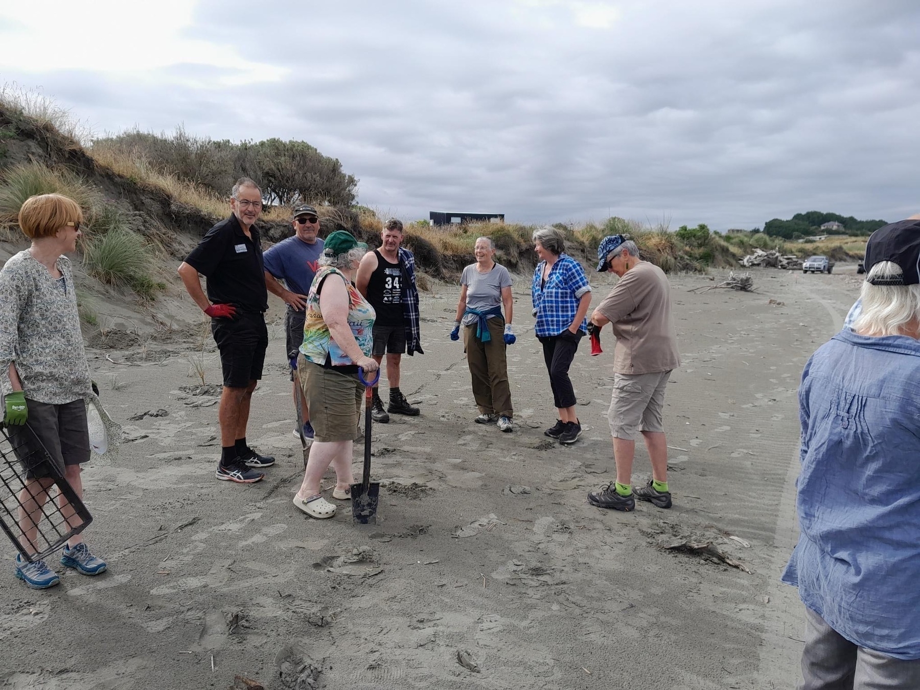 Some of the volunteers chatting on the beach. 